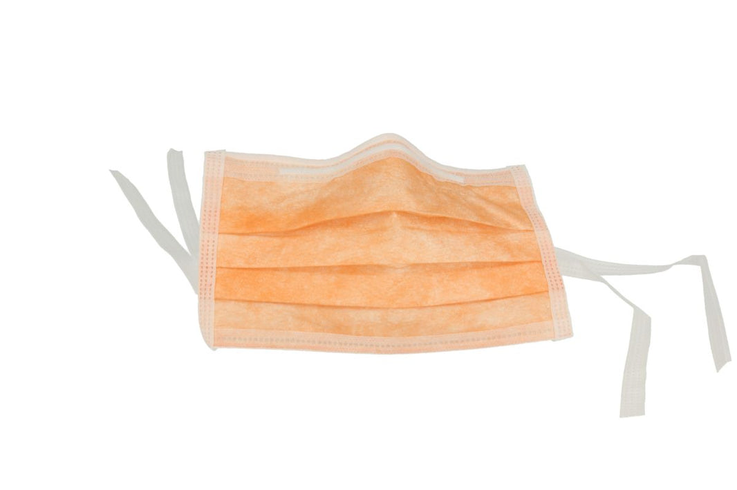 3-lagiger oranger Mundschutz mit drei Bändern für den dentalen Bereich.