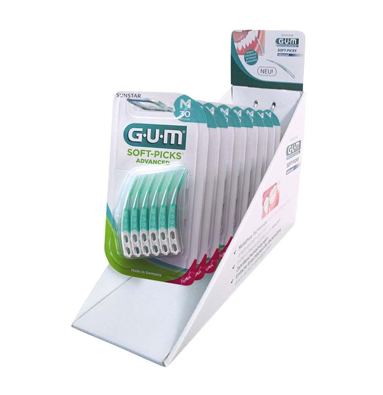 GUM® SOFT-PICKS® ADVANCED Display mit mehreren Interdentalbürsten-Packungen.
