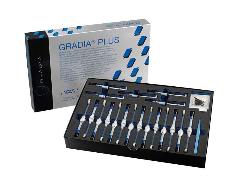 GRADIA® PLUS Layer-Set mit mehreren Spritzen und Zubehör in Verpackung.