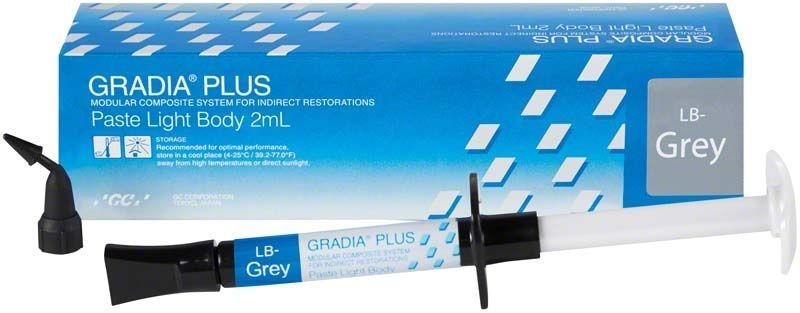GRADIA® PLUS Paste Light Body LB-grau Spritze neben Verpackung.
