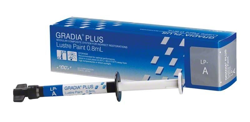 GRADIA® PLUS Lustre Paint LP-A Spritze vor blauer Verpackung.
