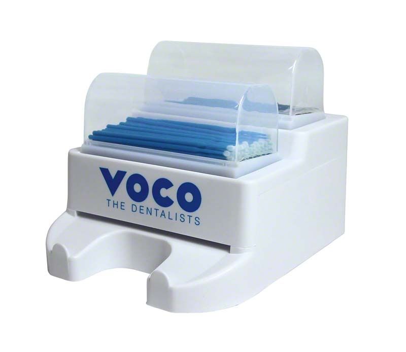 Spender für Applikationspinsel mit durchsichtigem Deckel und VOCO-Logo.