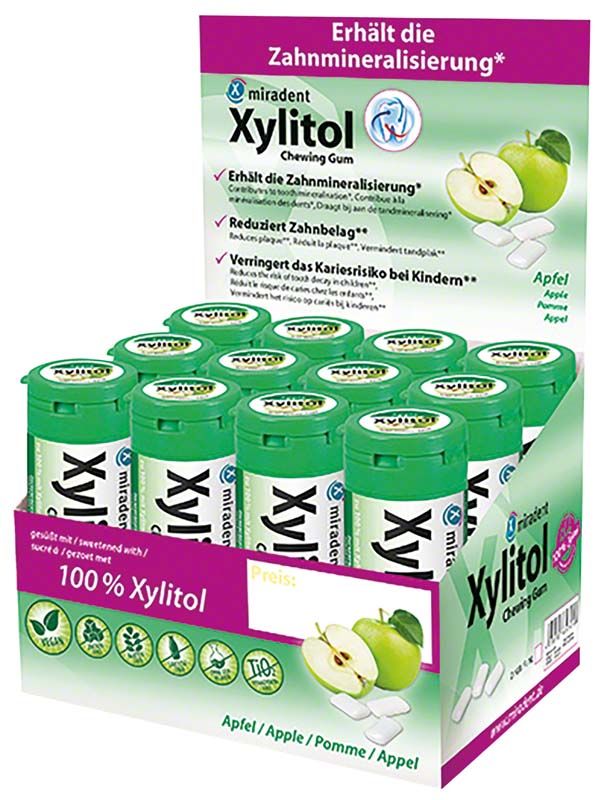 Xylitol-Kaugummi für Kinder mit Apfelgeschmack in grüner Verpackung.