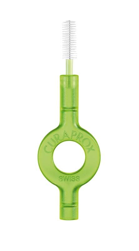 Grüne CURAPROX Interdentalbürste mit ultrafeinen Borsten und ergonomischem Griff.
