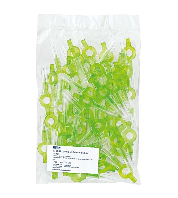 Transparente Verpackung mit zahlreichen grünen CURAPROX Interdentalbürsten für Zahnpflege.