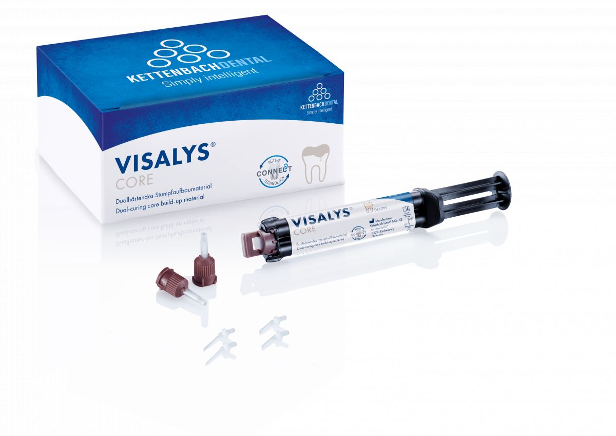 Visalys® Core Spritze Dentin mit Verpackung und Zubehörteilen auf weißem Hintergrund.