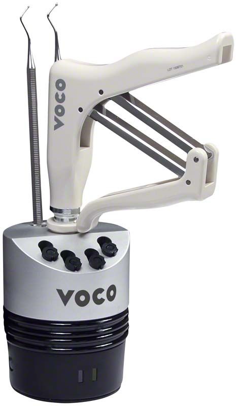 VOCO Caps Warmer mit integriertem Applikator und Heizkammer.