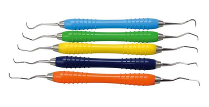 Fünf Paro-SET Colori Instrumente mit bunten ergonomischen Griffen.