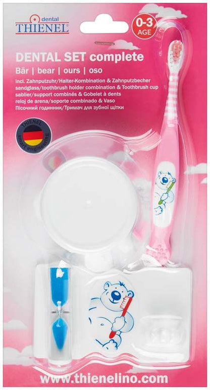 Zahnputzset für Babys mit rosa Zahnbürste und Zahnputzbecher.