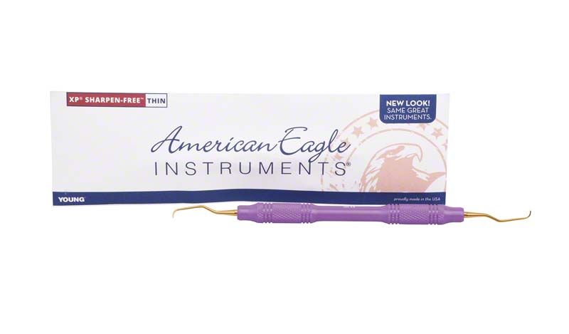 American Eagle XP Gracey Kürette mit lila Griff und goldenen Spitzen vor Verpackung.