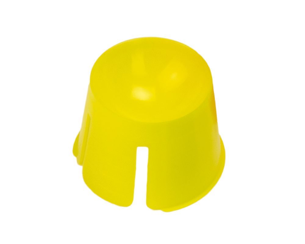 Monoart Dappenbecher in Gelb mit Einkerbungen und rutschfester Unterseite.