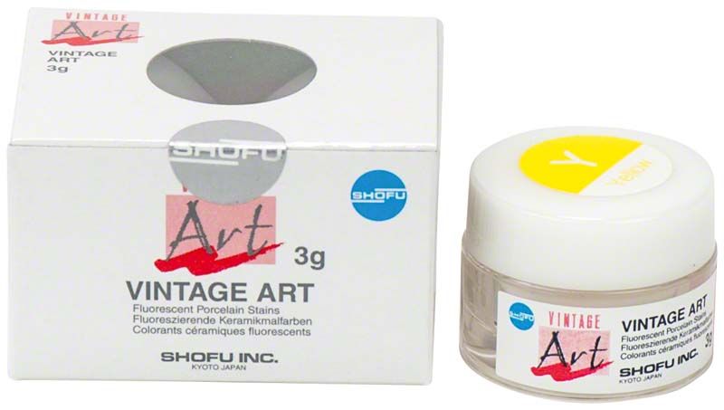 Vintage Art Base Color Stains Y in gelber Verpackung neben einer weißen Box.