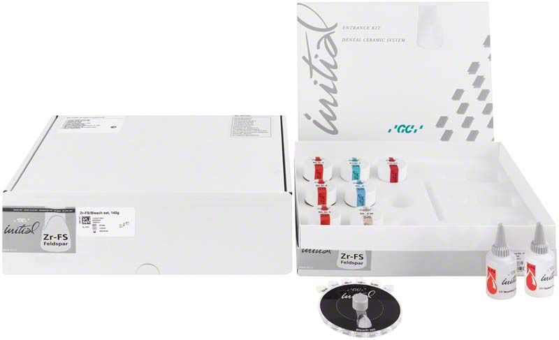 GC Initial Zr-FS Bleach Shade Set mit geöffnetem Verpackungsinhalt und Farbskala.