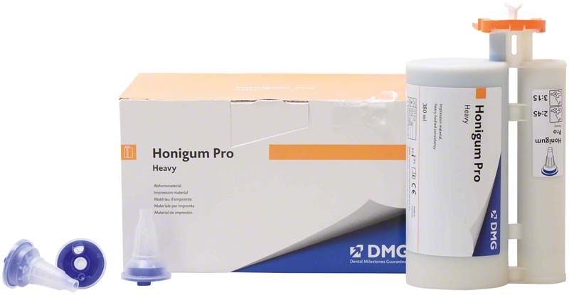 Honigum Pro-Heavy Kartusche 380ml neben Originalverpackung von DMG.