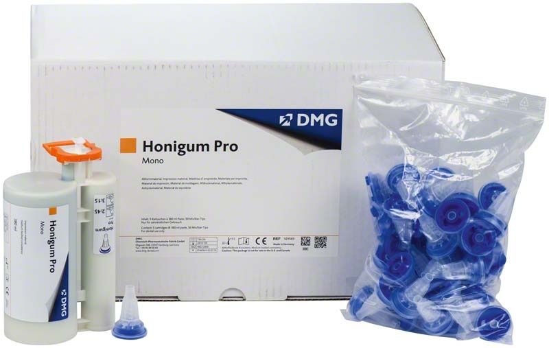 Honigum Pro-Mono Kartuschen und Zubehör vor Verpackung.