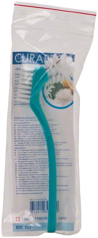 CURAPROX BDC St. Prothesenbürste in mintgrüner Farbe in Verpackung.