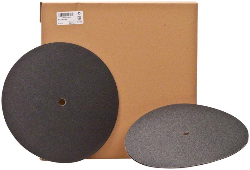 Trimmerscheiben Klettfix für Nasstrimmen mit Verpackung im Hintergrund.