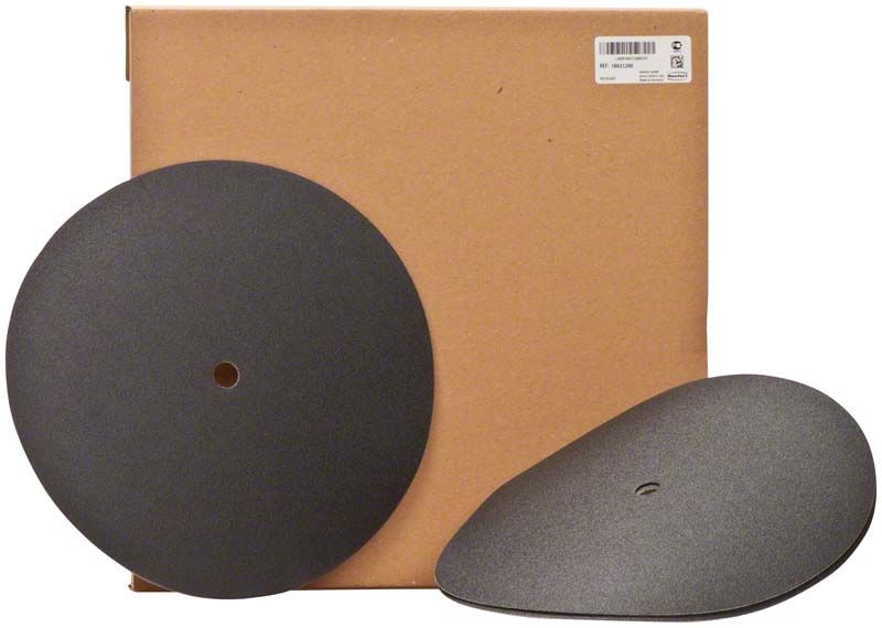 Trimmerscheiben Klettfix für Nasstrimmen, vor brauner Verpackung.