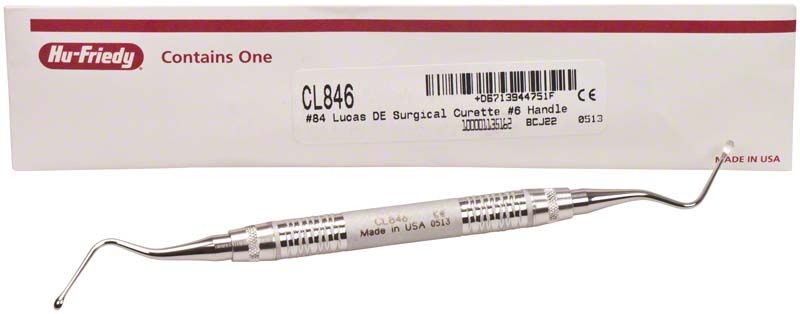 Chirurgische Kürette Lucas löffelförmig Figur 84 mit Griff, auf Verpackung.