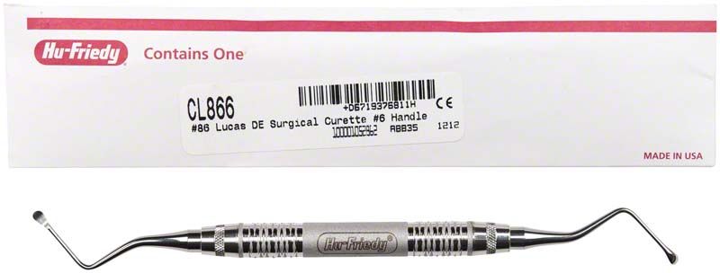 Chirurgische Kürette Lucas löffelförmig mit Griff, vor Verpackung platziert.