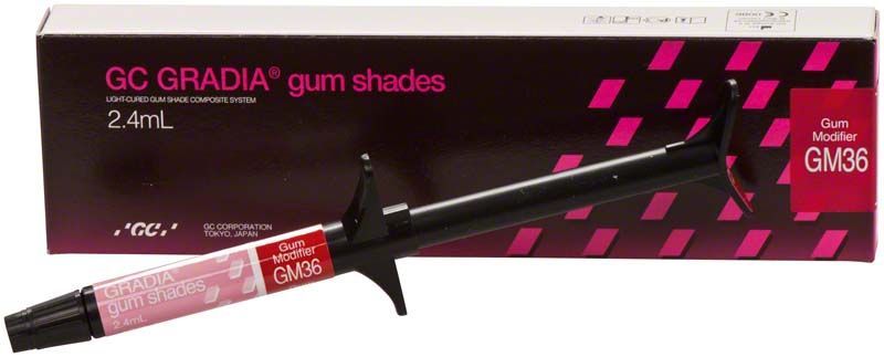 Gradia Gum Modifier GM36 Spritze vor Verpackung mit rosa Etikett.