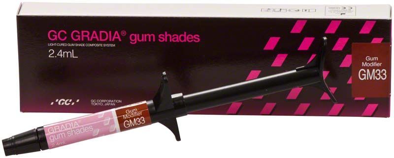 Gradia Gum Modifier GM33 in Spritzenform mit Verpackung im Hintergrund.