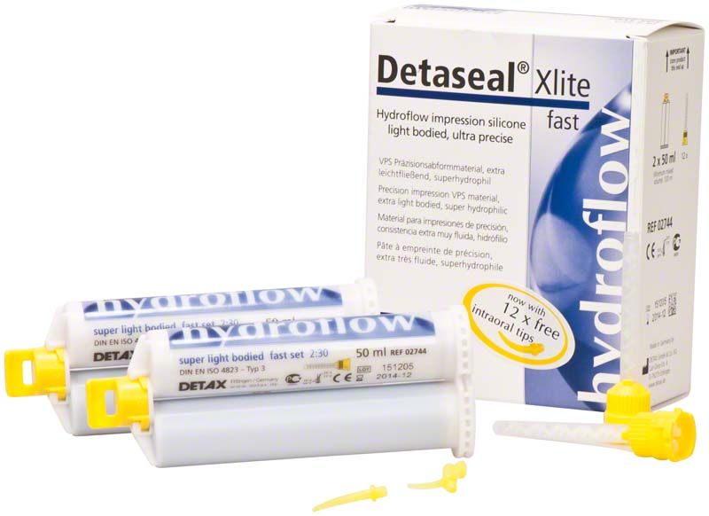 Detaseal Xlite Kartuschen und Verpackung mit Zubehör für Dentalabformungen.