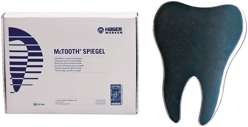 McTooth® Handspiegel in Zahnform neben Verpackung.