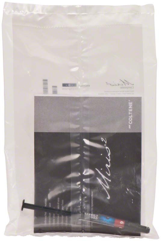 Spritze mit goldener Effektmasse "Miris 2" in Verpackung.