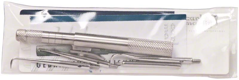 Automatisches Kronenentferner-Set mit Metallinstrumenten in transparenter Verpackung.