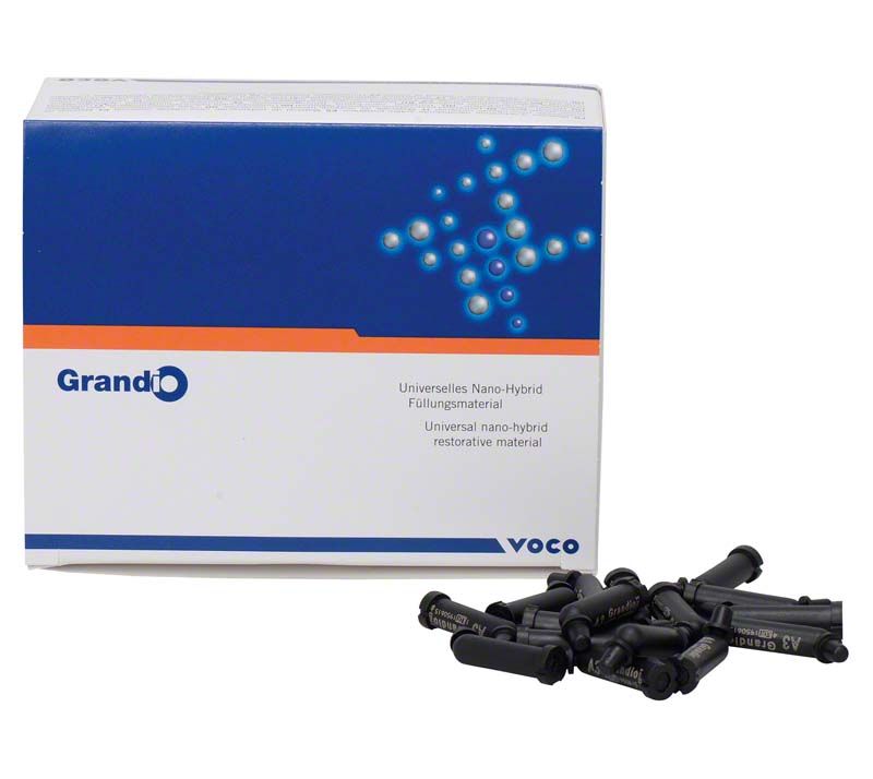 Grandio® Caps A3 Eco-Pack mit Verpackung und schwarzen Applikatorkapseln.