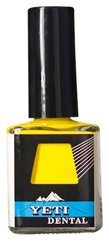 Gelber DIE SPACER Lack in Flasche mit schwarzem Verschluss.