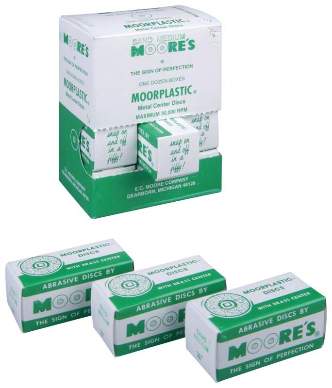 Drei grüne Moorplastic Schachteln mit der Aufschrift "Moore's Abrasive Discs".