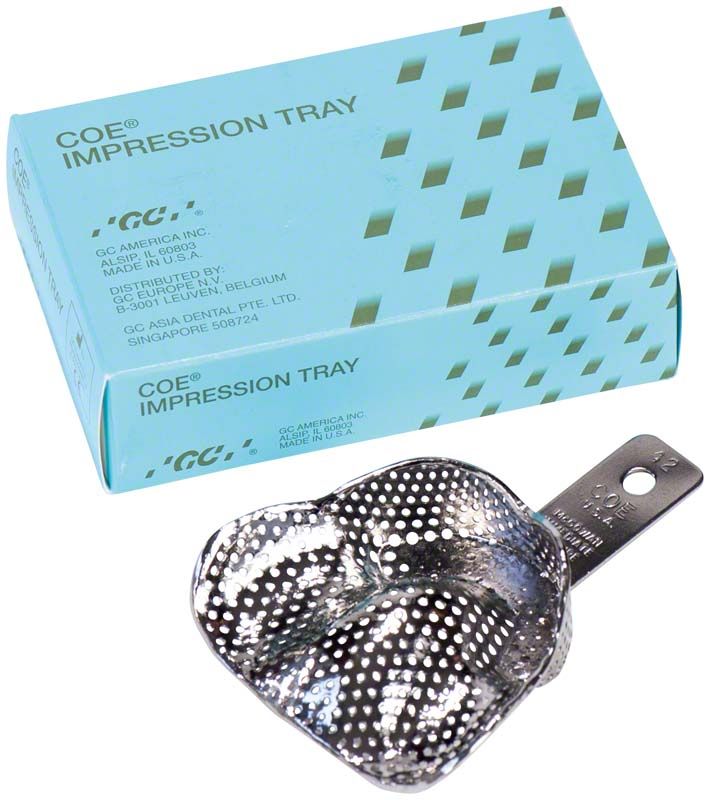 Metall-Löffel für Abdrücke, McGowan #42, mit Verpackung im Hintergrund.