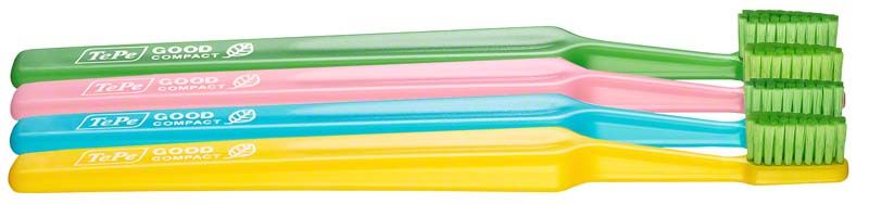 Vier TePe GOOD™ Zahnbürsten Compact Soft in verschiedenen Farben.