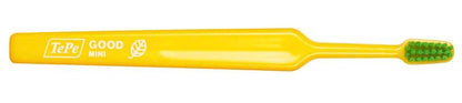 Gelbe TePe GOOD™ Zahnbürste Mini Extra Soft mit Biokunststoff-Griff aus Zuckerrohr.