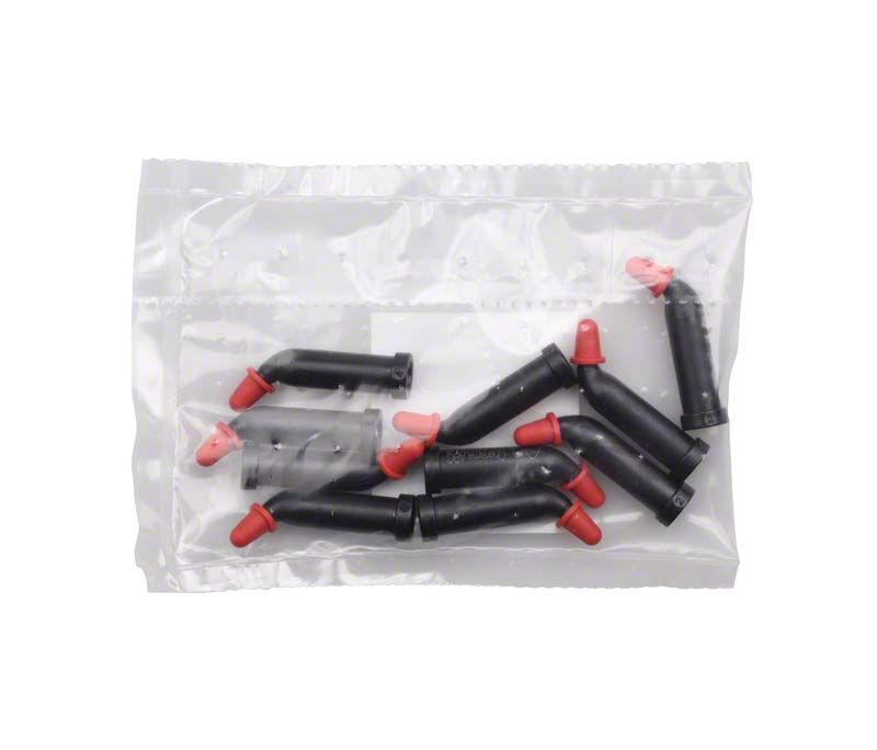 Nachfüllpackung mit schwarzen Hybridkomposit-Kapseln und roten Spitzen in Plastikbeutel.