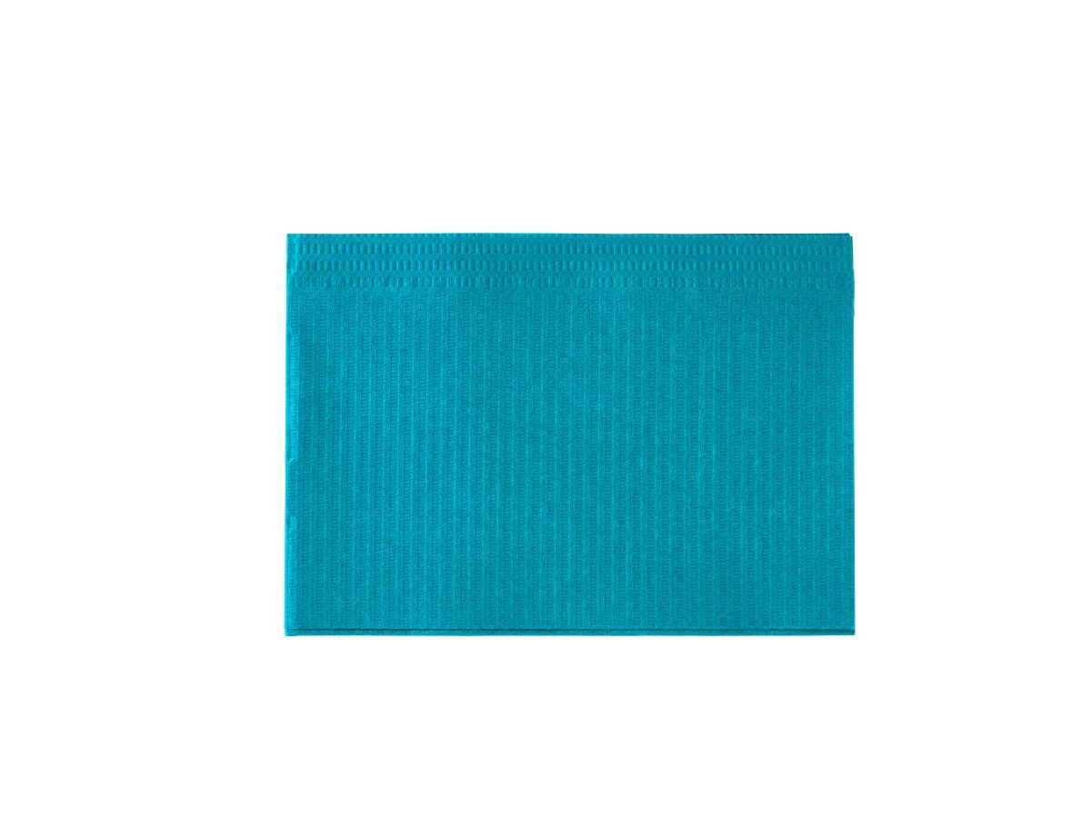 Monoart Patientenserviette Towel UP in Lagunablau, gefaltet auf weißem Hintergrund.