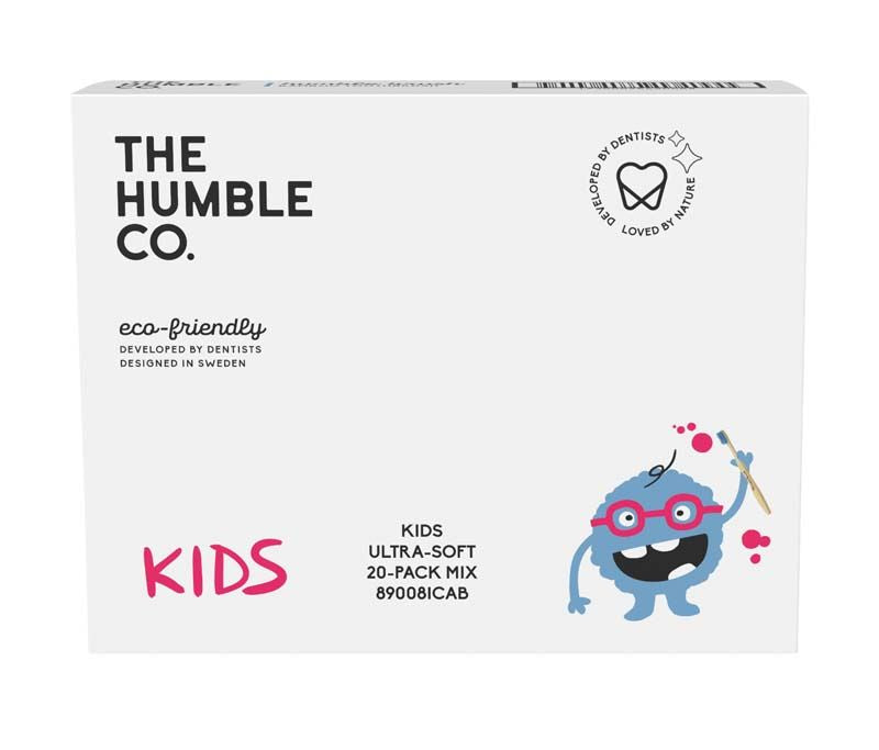 Kinderzahnbürsten-Verpackung "Humble Brush Kinder ultrasoft sortiert" mit blauem Cartoon-Monster.