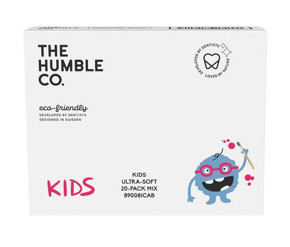 Kinderzahnbürsten-Verpackung "Humble Brush Kinder ultrasoft sortiert" mit blauem Cartoon-Monster.