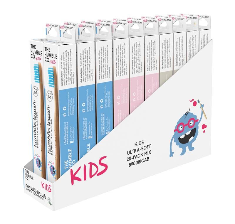 Kinderzahnbürsten-Display "Humble Brush Kinder ultrasoft sortiert" mit blauem und rosa Monster.