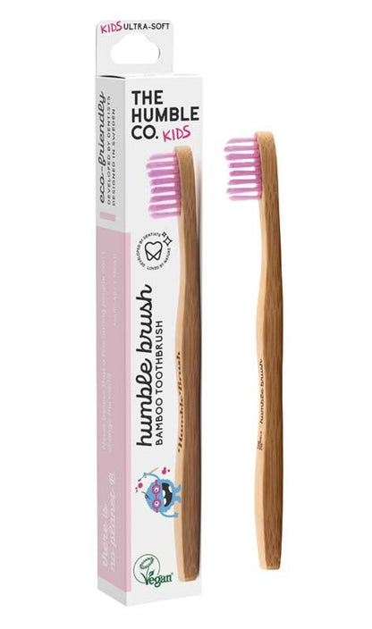 Humble Brush Kinderzahnbürste lila mit Bambusgriff und Verpackung.