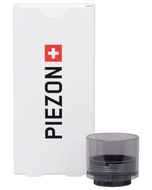 Weißer Pappkarton mit dem Schriftzug "PIEZON" und Schutzkappe darunter.