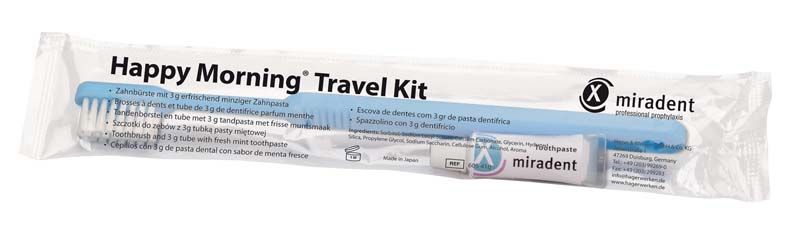 Einwegzahnbürste mit minziger Zahnpasta im Happy Morning® Travel Kit Verpackung.