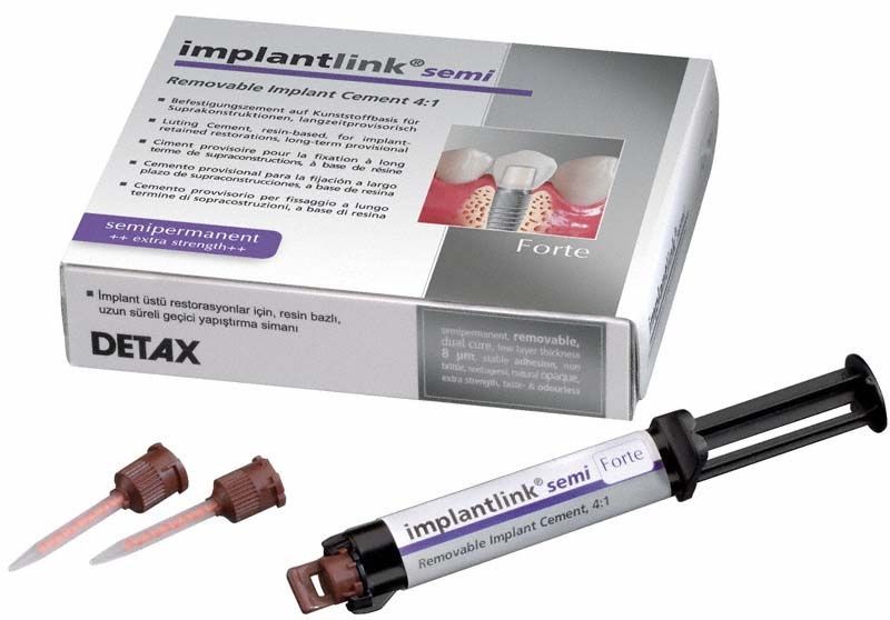 Implantlink semi forte Befestigungszement-Spritze mit Verpackung und Applikationsdüsen.