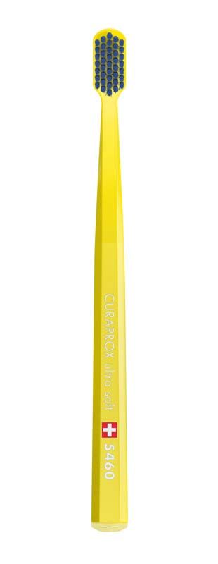 CURAPROX sensitive CS 5460 ultrasoft Zahnbürste in gelber Farbe mit weichen Borsten.