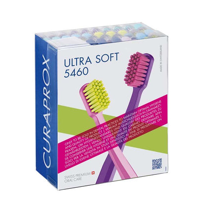 CURAPROX sensitive CS 5460 Zahnbürste in Verpackung mit lila und gelber Bürste.