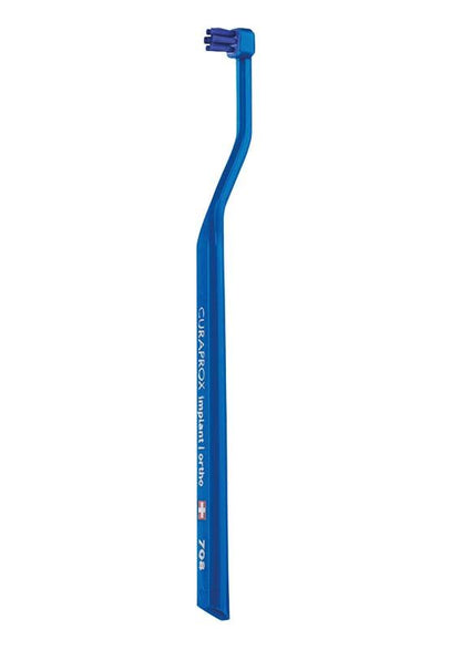 CURAPROX sensitive CS 708 Zahnbürste mit biegsamem Griff und kompaktem Bürstenkopf.