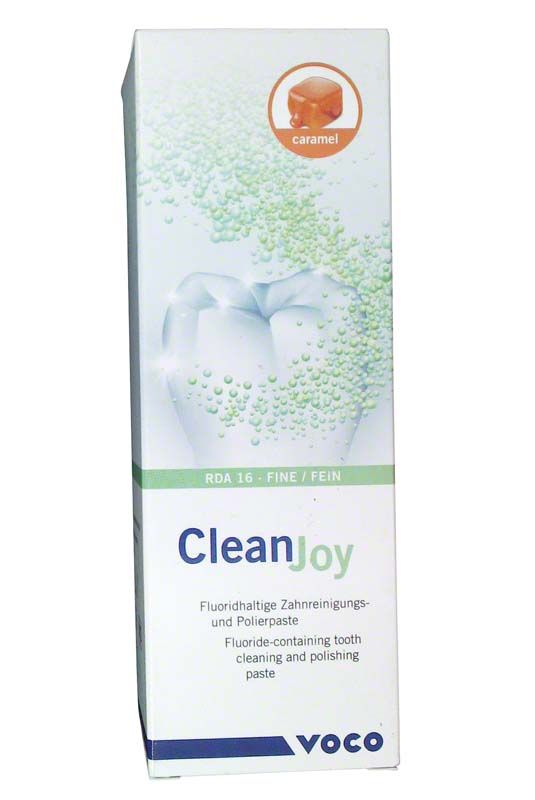 Fluoridhaltige Zahnreinigungspaste CleanJoy® Tube caramel fein in Verpackung.