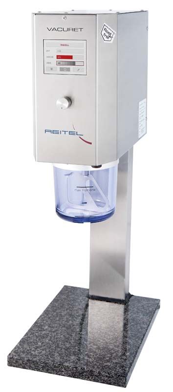 VACURET DIGIT Vakkumrührgerät mit Edelstahlgehäuse und blauem Behälter auf Granitsockel.